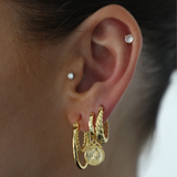 Obročne uhane s twist dizajnom