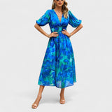 Clara – Elegantna cvetlična midi obleka