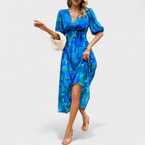 Clara – Elegantna cvetlična midi obleka