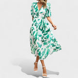 Clara – Elegantna cvetlična midi obleka