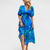 Clara – Elegantna cvetlična midi obleka