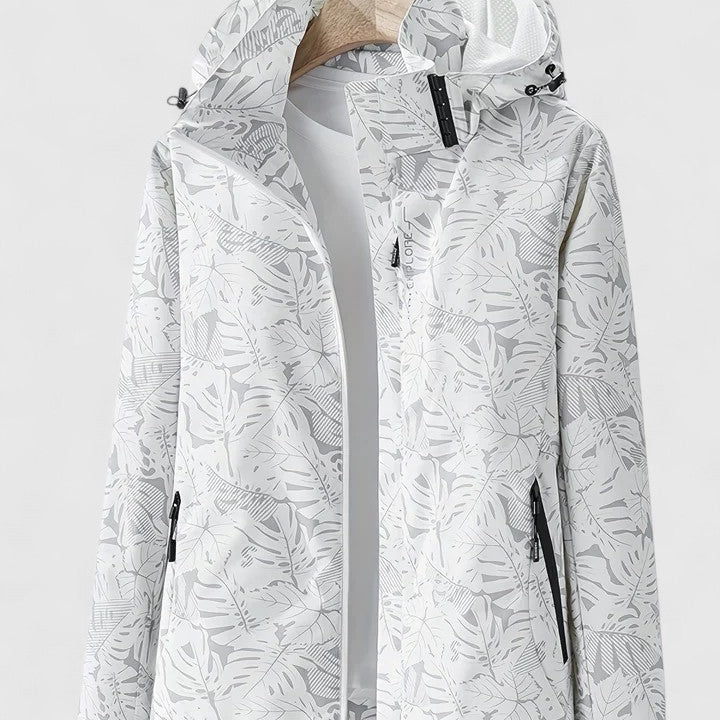 Tjaša – Elegantna vetrovka z botaničnim vzorcem