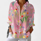 Nika – Poletna bluzica z živahnim potiskom