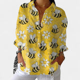 Nika – Poletna bluzica z živahnim potiskom